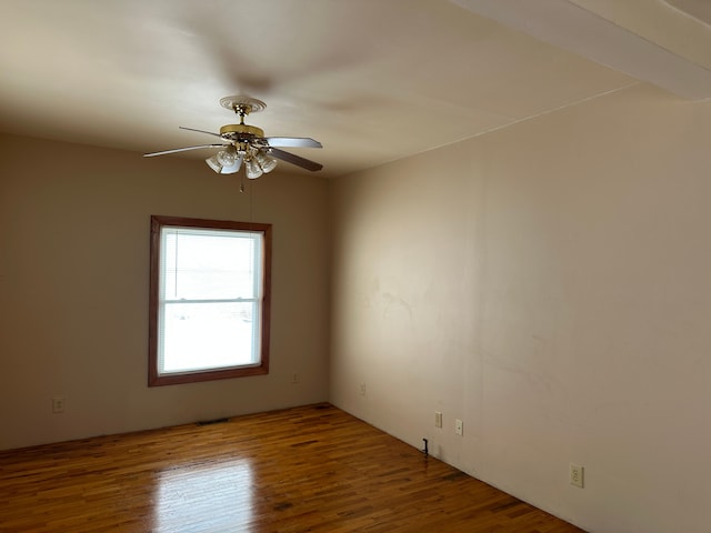 4469 Cooper Rd, Marlette, MI 48453 - empty room with wood finished floors and a ceiling fan