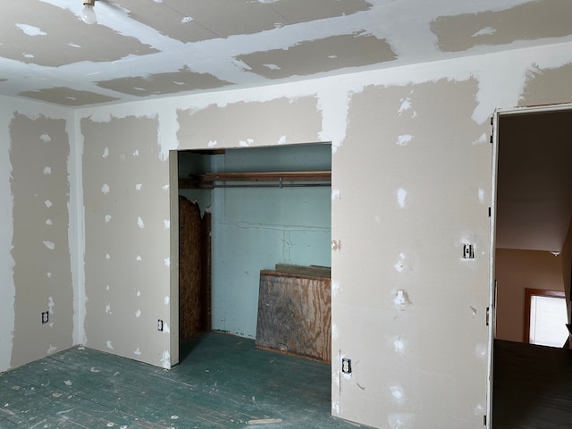 4469 Cooper Rd, Marlette, MI 48453 - unfurnished bedroom featuring a closet