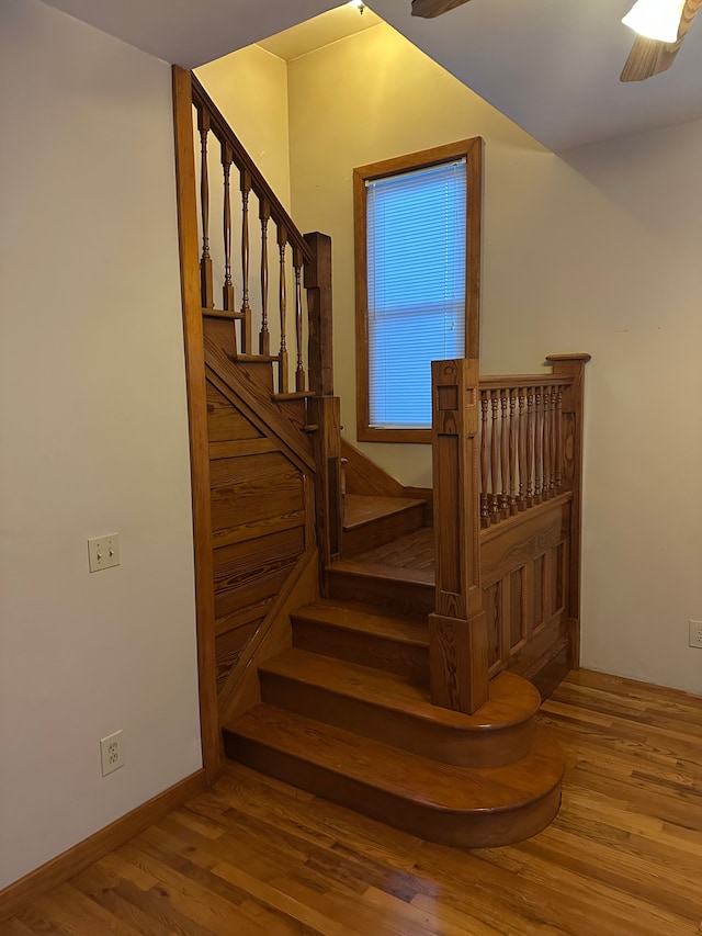 4469 Cooper Rd, Marlette, MI 48453 - staircase with baseboards and wood finished floors