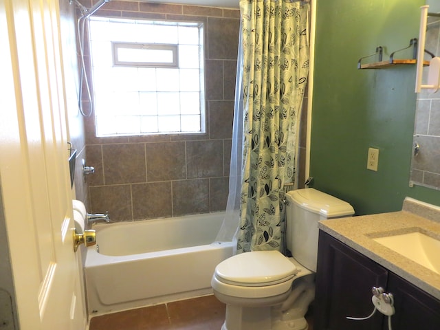 bathroom featuring toilet, shower / bathtub combination with curtain, and vanity