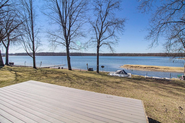 exterior space featuring a water view and a yard