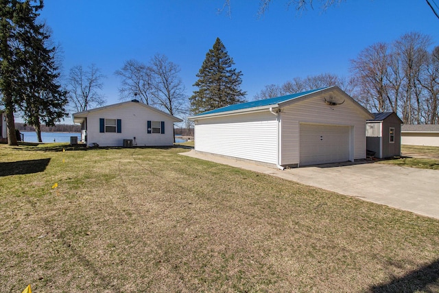exterior space with driveway and central AC