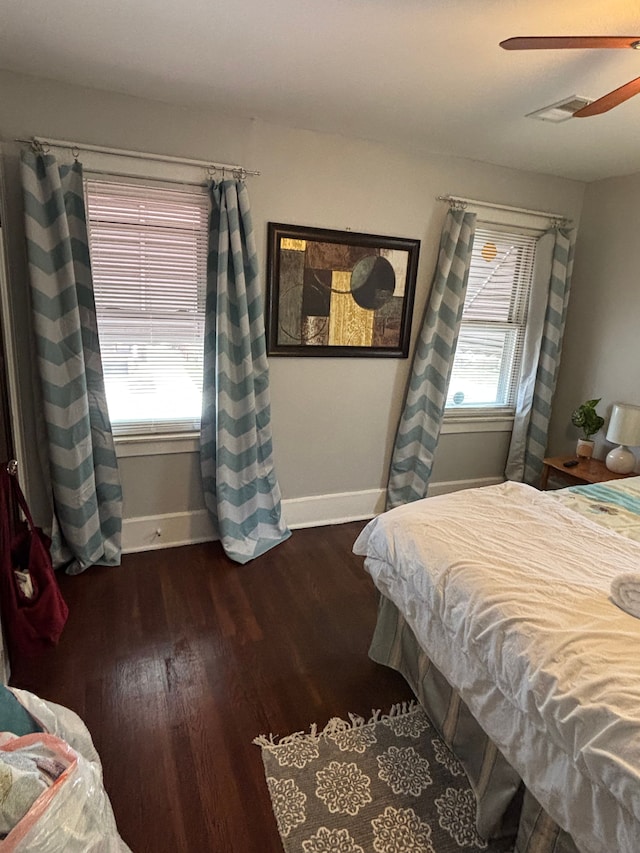 4074 Pasadena St, Detroit, MI 48238 - bedroom featuring baseboards, visible vents, wood finished floors, and a ceiling fan