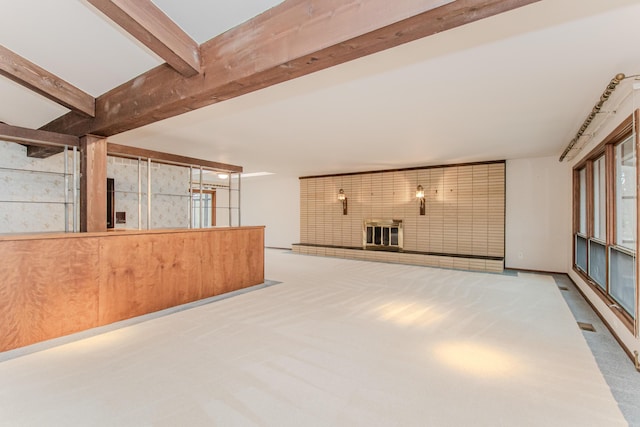 4710 Cove Rd, West Bloomfield, MI 48323 - unfurnished living room featuring beamed ceiling and carpet
