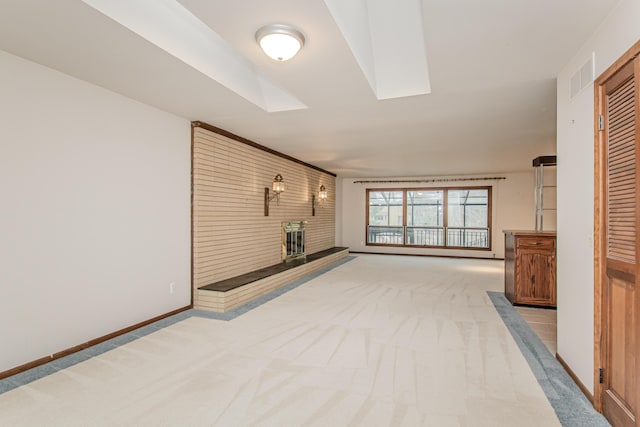 4710 Cove Rd, West Bloomfield, MI 48323 - unfurnished living room featuring carpet flooring, a fireplace, and baseboards