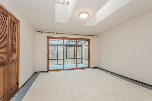4710 Cove Rd, West Bloomfield, MI 48323 - unfurnished bedroom featuring access to exterior, carpet flooring, and baseboards