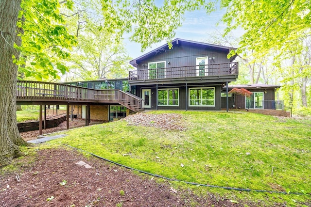 4710 Cove Rd, West Bloomfield, MI 48323 - rear view of house featuring a deck, stairway, and a lawn