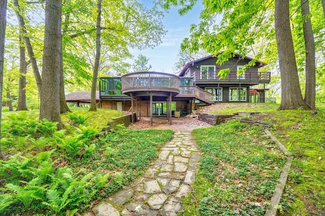 4710 Cove Rd, West Bloomfield, MI 48323 - rear view of property featuring a wooden deck and stairs