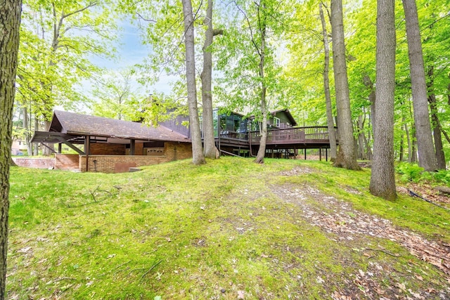 4710 Cove Rd, West Bloomfield, MI 48323 - view of yard with a wooden deck