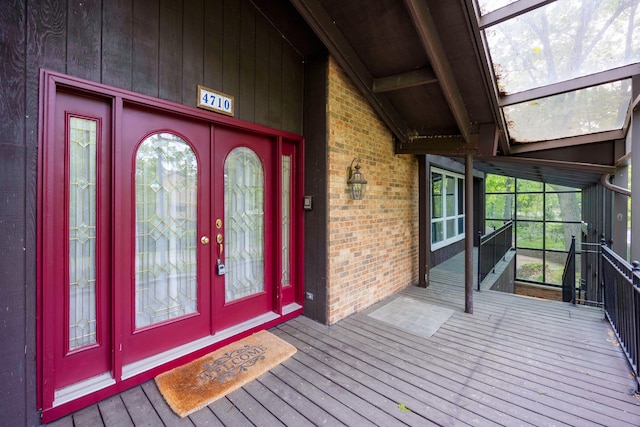 4710 Cove Rd, West Bloomfield, MI 48323 - doorway to property with french doors and brick siding