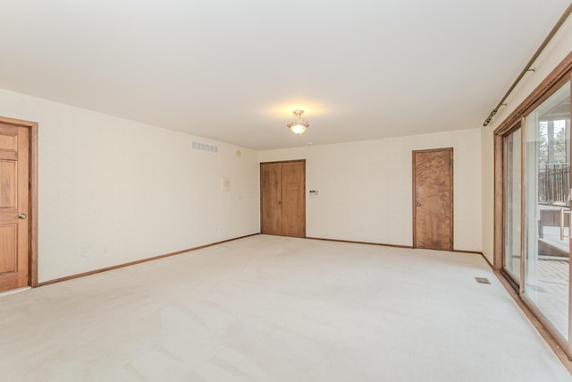 4710 Cove Rd, West Bloomfield, MI 48323 - unfurnished room featuring light carpet and baseboards