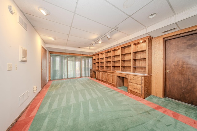 4710 Cove Rd, West Bloomfield, MI 48323 - unfurnished living room featuring track lighting and light carpet