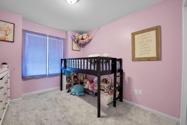 bedroom featuring visible vents, baseboards, and carpet floors