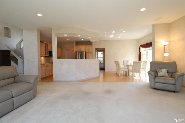 7241 Hidden Valley Dr, Lambertville, MI 48144 - living room featuring stairs, light colored carpet, and recessed lighting