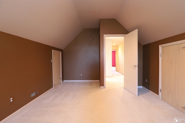7241 Hidden Valley Dr, Lambertville, MI 48144 - bonus room featuring light carpet, baseboards, and lofted ceiling