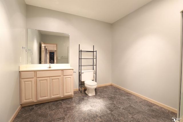 7241 Hidden Valley Dr, Lambertville, MI 48144 - bathroom with baseboards, toilet, and vanity