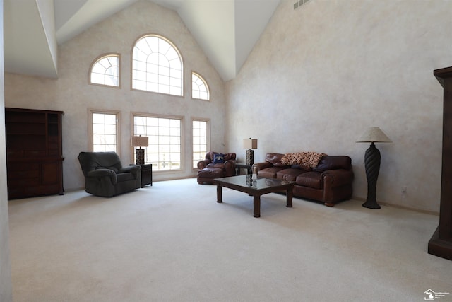 7241 Hidden Valley Dr, Lambertville, MI 48144 - carpeted living room featuring high vaulted ceiling and visible vents