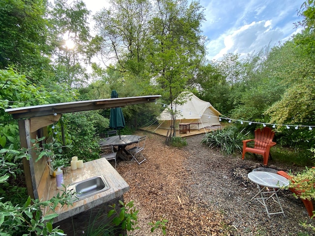 view of yard featuring a deck