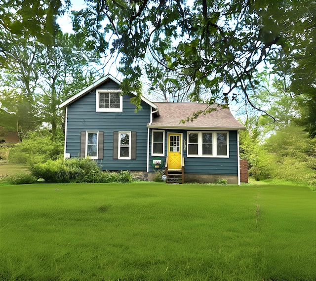 5366 Sawyer Rd, Sawyer, MI 49125 - view of front of home featuring entry steps, a front yard, and roof with shingles