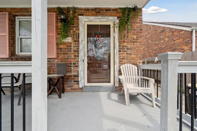 15032 Snowden St, Detroit, MI 48227 - property entrance featuring brick siding and a porch