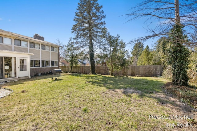 view of yard featuring fence