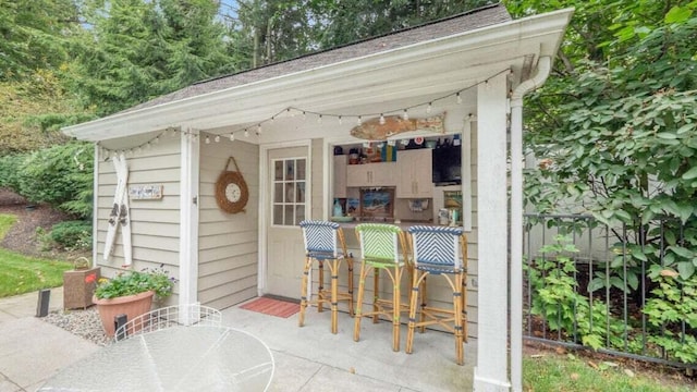 3820 Harbor Point Dr, Norton Shores, MI 49441 - view of outbuilding with outdoor dining area and outdoor dry bar