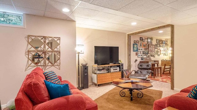 carpeted living room with recessed lighting and a drop ceiling