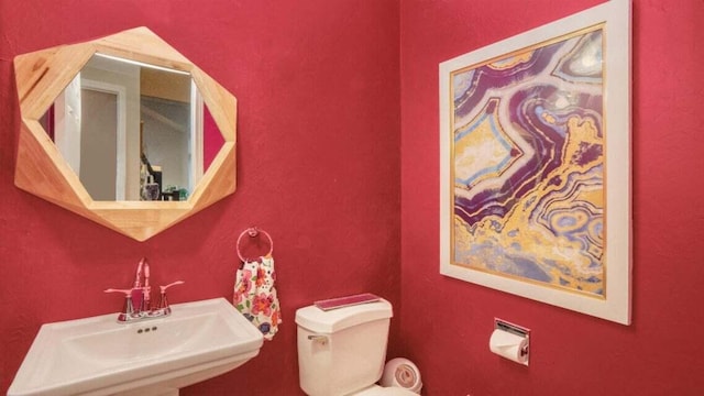 3820 Harbor Point Dr, Norton Shores, MI 49441 - bathroom featuring a sink and toilet