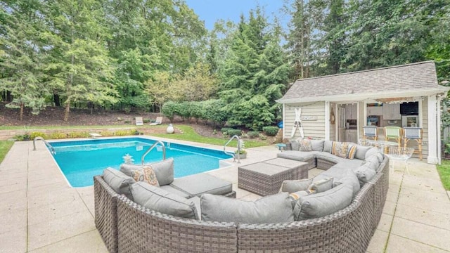 outdoor pool with an outdoor hangout area, outdoor dry bar, and a patio