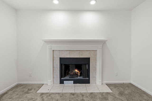 room details featuring baseboards, a fireplace, recessed lighting, and carpet