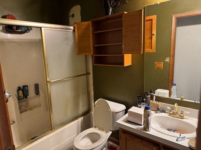 25966 Peppertree Ln, Warren, MI 48091 - bathroom with toilet, vanity, and combined bath / shower with glass door