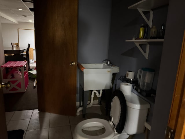 25966 Peppertree Ln, Warren, MI 48091 - bathroom with tile patterned floors, a sink, and toilet