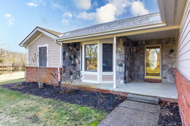 1405 S Sashabaw Rd, Ortonville, MI 48462 - doorway to property featuring stone siding