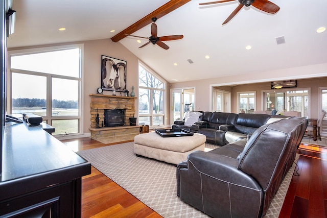 1405 S Sashabaw Rd, Ortonville, MI 48462 - living area featuring a fireplace, ceiling fan, and wood finished floors