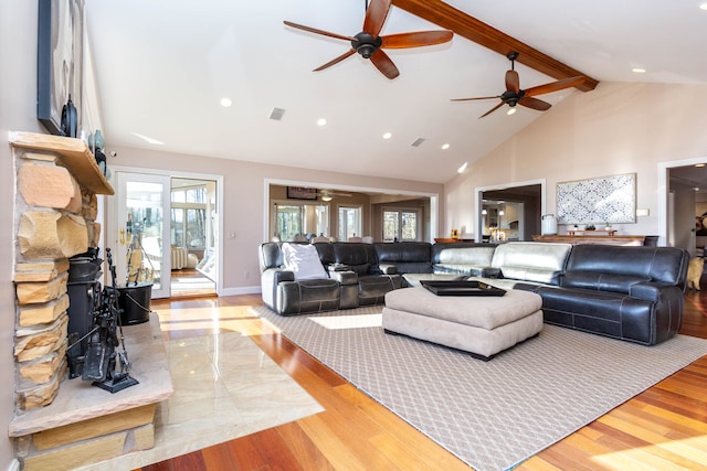 1405 S Sashabaw Rd, Ortonville, MI 48462 - living room with high vaulted ceiling, baseboards, beam ceiling, ceiling fan, and wood finished floors