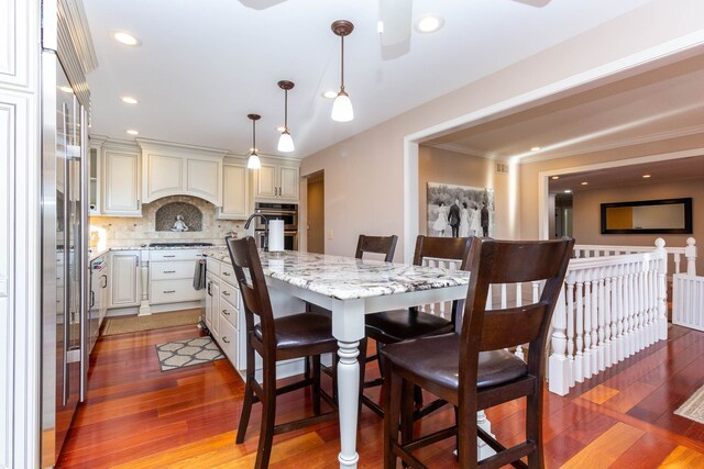 1405 S Sashabaw Rd, Ortonville, MI 48462 - dining room with recessed lighting, ornamental molding, ceiling fan, and light wood-type flooring