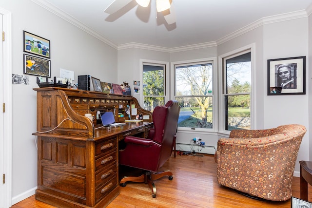 1405 S Sashabaw Rd, Ortonville, MI 48462 - office area featuring wood finished floors, a baseboard heating unit, a ceiling fan, and plenty of natural light