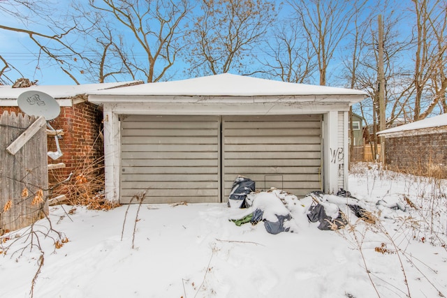 18104 Northlawn St, Detroit, MI 48221 - snow covered garage featuring fence and a garage