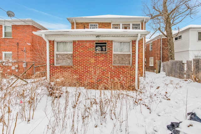 18104 Northlawn St, Detroit, MI 48221 - snow covered property featuring brick siding and fence