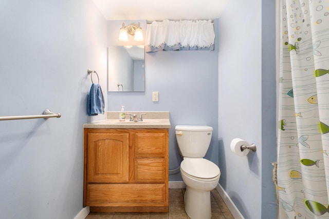 full bath featuring baseboards, toilet, tile patterned flooring, and vanity