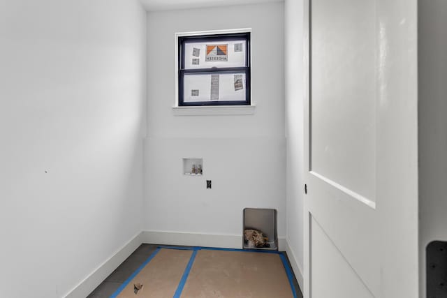 215 Nottingham Dr, Brooklyn, MI 49230 - washroom with baseboards and washer hookup