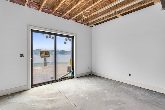 215 Nottingham Dr, Brooklyn, MI 49230 - spare room with unfinished concrete floors