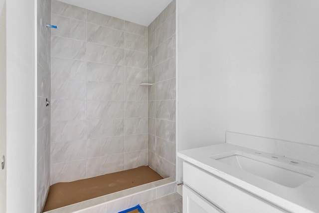 215 Nottingham Dr, Brooklyn, MI 49230 - bathroom with a tile shower and vanity