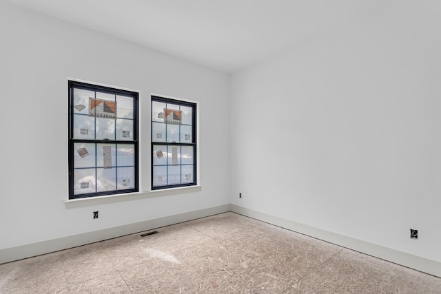 215 Nottingham Dr, Brooklyn, MI 49230 - spare room with baseboards
