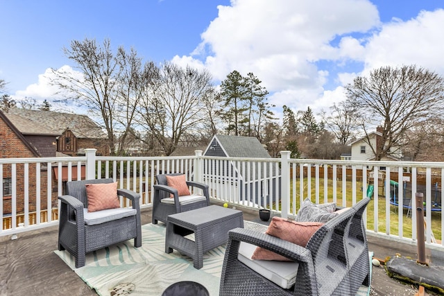1515 W Franklin St, Jackson, MI 49203 - deck with an outdoor hangout area and an outbuilding