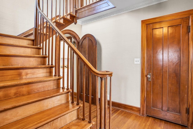 1515 W Franklin St, Jackson, MI 49203 - stairs featuring baseboards and wood finished floors