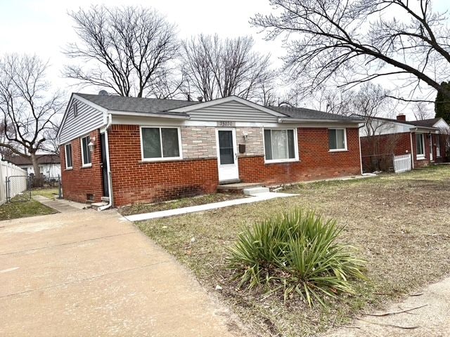 35030 Michelle Dr, Romulus, MI 48174 - view of front of property with brick siding and fence