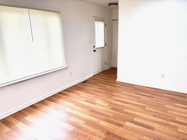 35030 Michelle Dr, Romulus, MI 48174 - empty room with baseboards and light wood-style floors