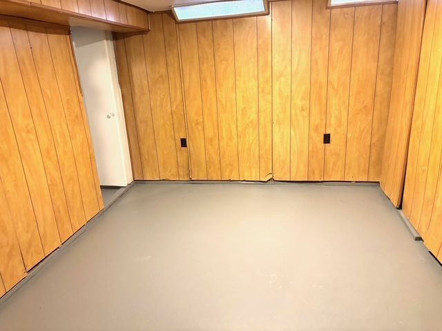 35030 Michelle Dr, Romulus, MI 48174 - basement with wood walls