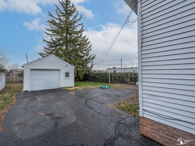 detached garage with fence